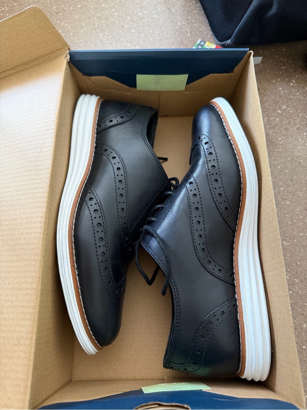 Cole Haan Black Leather Wingtip Oxfords with White Sole